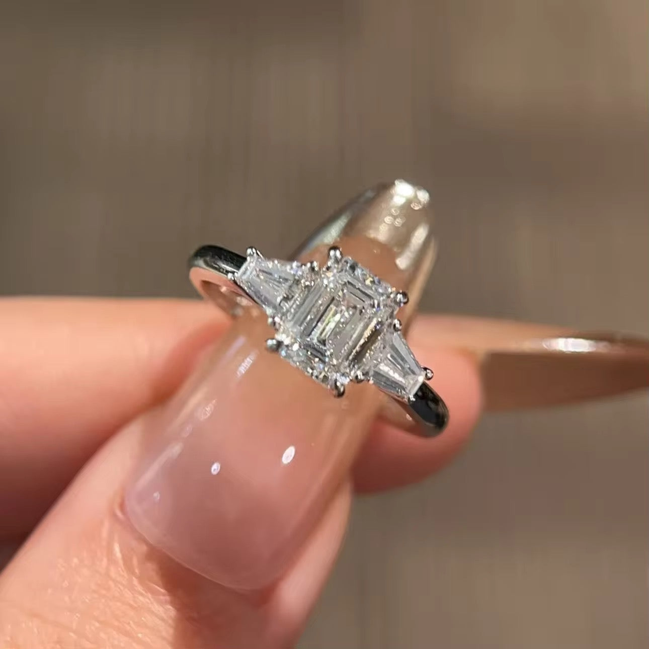 Regal Cascade Emerald-Cut Diamond Ring