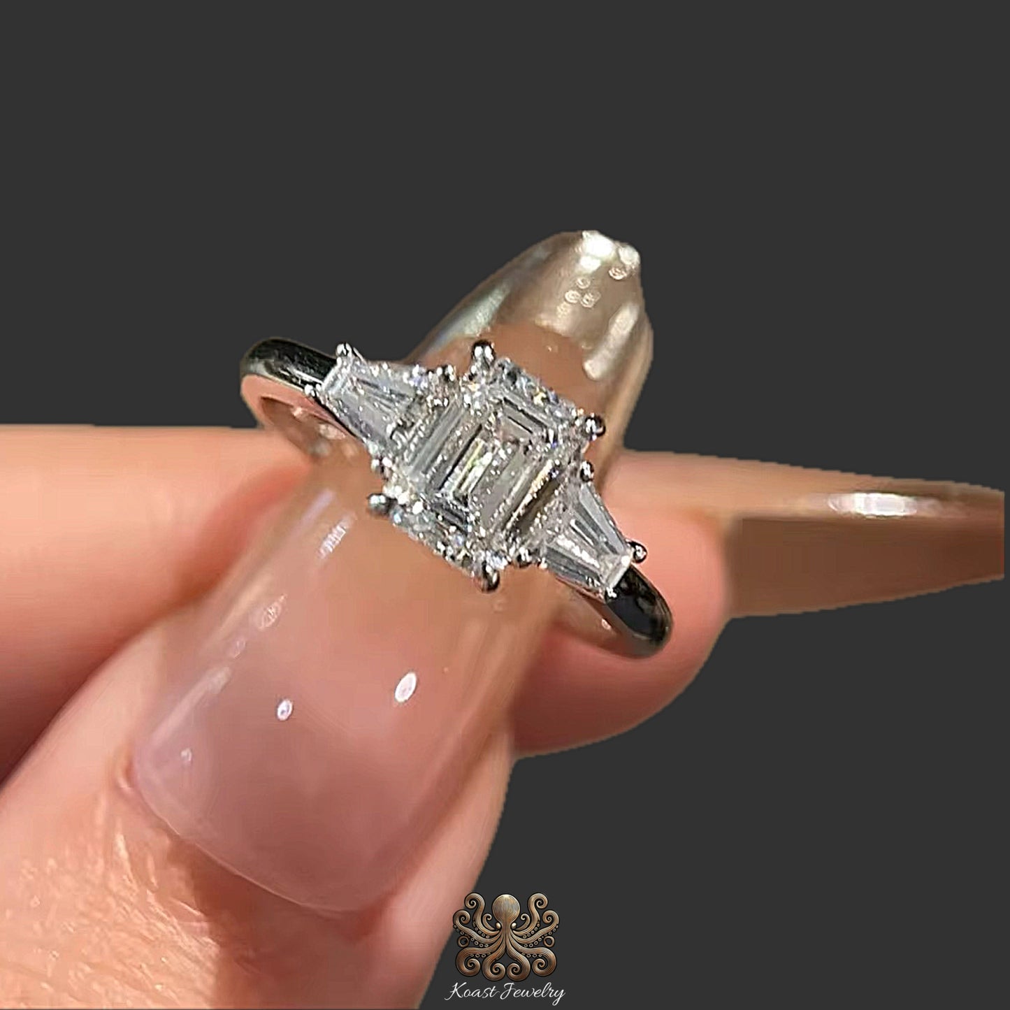 Regal Cascade Emerald-Cut Diamond Ring